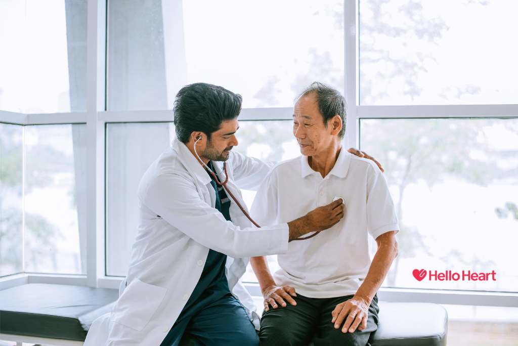 Doctor checking a patient's heart with a stethoscope