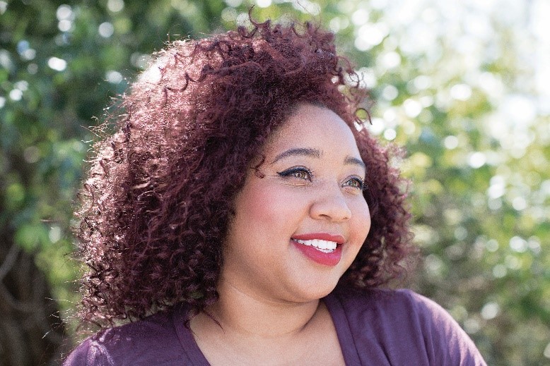 Smiling woman looking forward