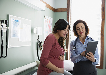 pregnant woman at doctor's office