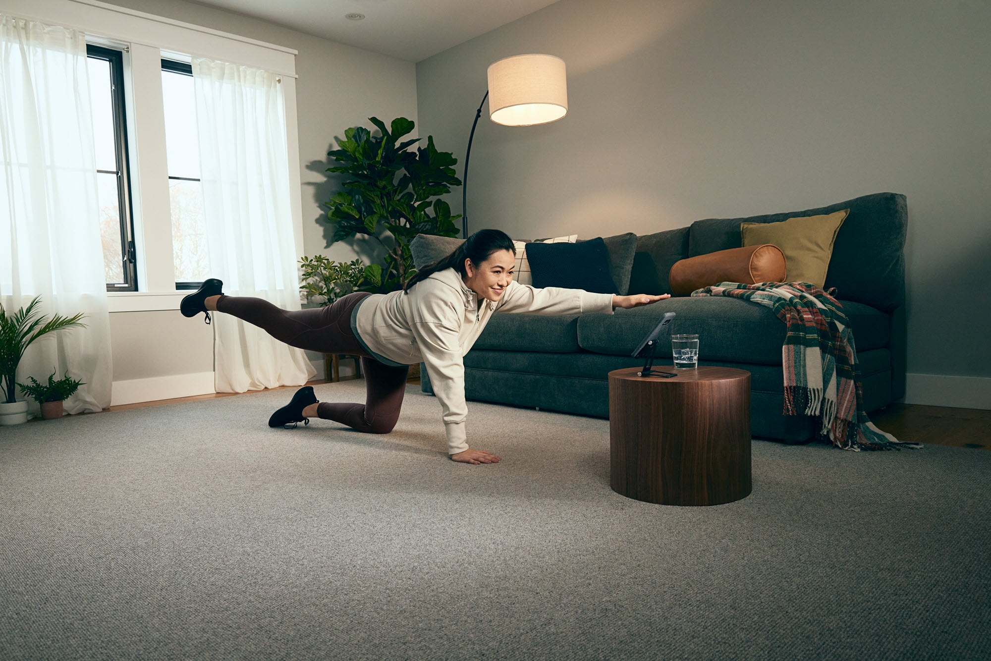 woman stretching on the floor
