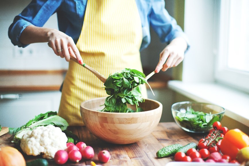 Person making salad